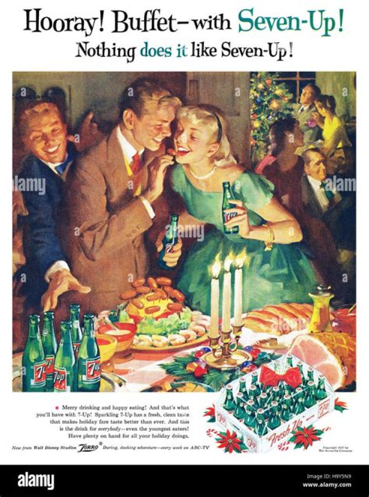  A 1950s Christmas advert for boot polish featuring a scantily clad woman on her knees holding a sign with her new year's resolution written on it