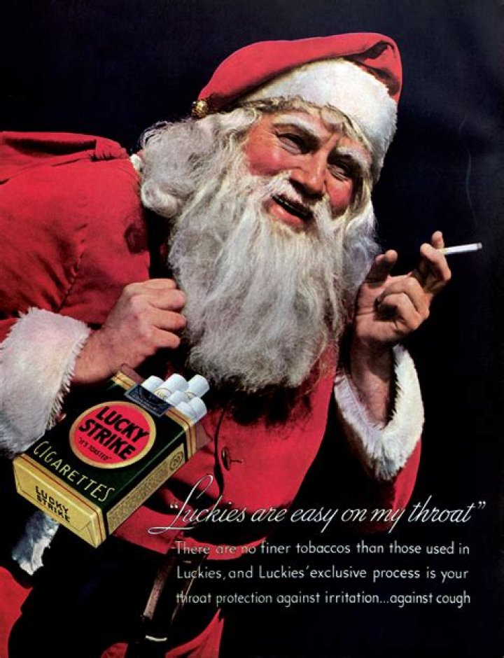  A 1980s cigarette Christmas advert featuring a smoking Santa Claus. Many cigarette companies had used a smoking Santa to sell their products, but this advert is significant as it's one of the first to carry a warning from the surgeon general in America