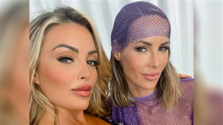 A champion swimmer went braless as she stunned in a see-through outfit