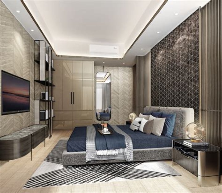 A deluxe master bedroom is where Cathy stays, featuring a jacuzzi