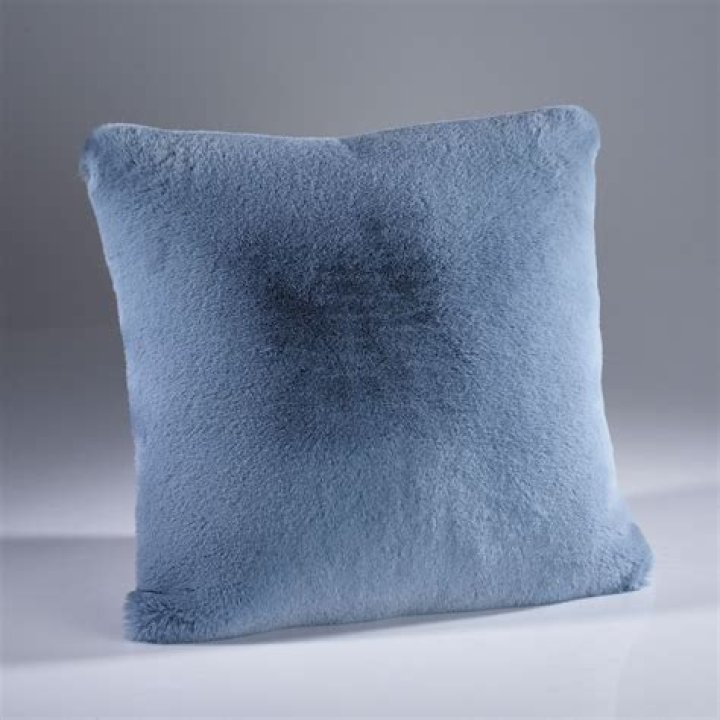 A faux fur cushion is a winter-essential and you pick up one from Aldi for less than &pound;9