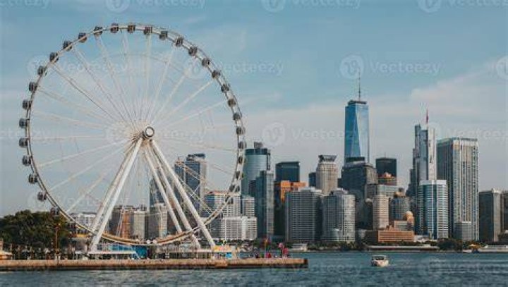 A ferris wheel overlooking the market