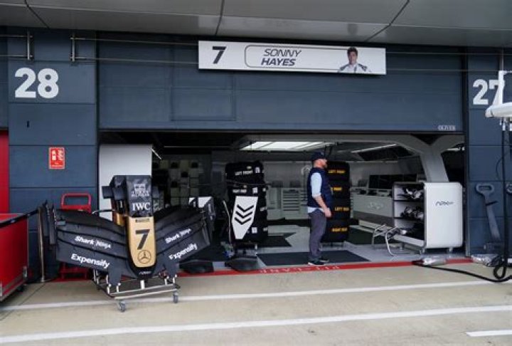 A fiction F1 team garage was arranged for filming Apex