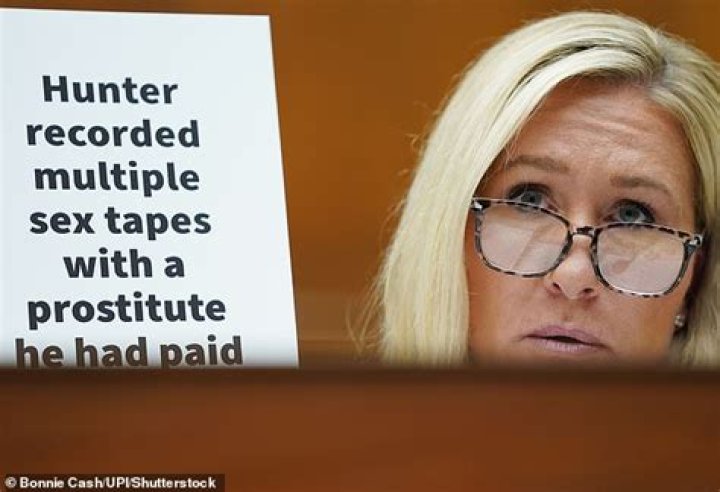 A prostitute Hunter had at least three threesomes with lights his crack pipe