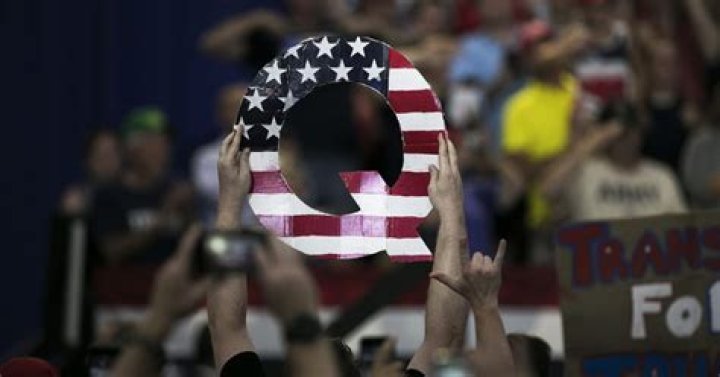 A QAnon supporter is pictured here