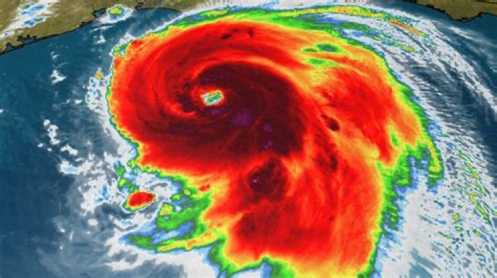 A satellite image of Hurricane Idalia, center, over Florida and crossing into Georgia