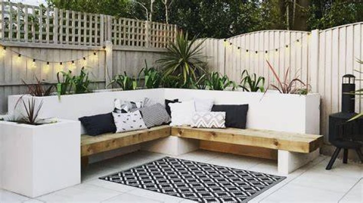 A seating area looks out onto one of the pools
