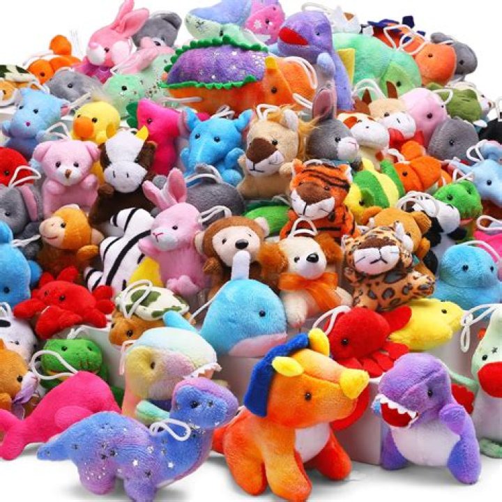 A stuffed animal, a toy ice cream scooper, and other kids' playthings could be spotted nestled along the front edge of the couch