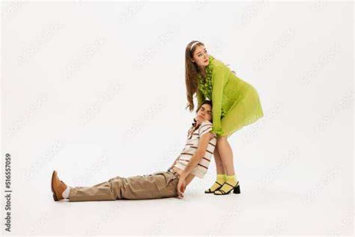  A woman is dragged along the floor