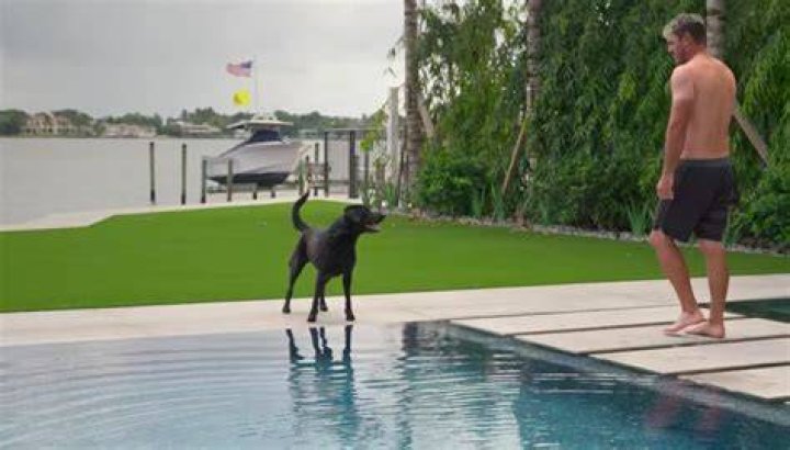 A yacht mooring behind Koepka can be seen during Netflix's filming