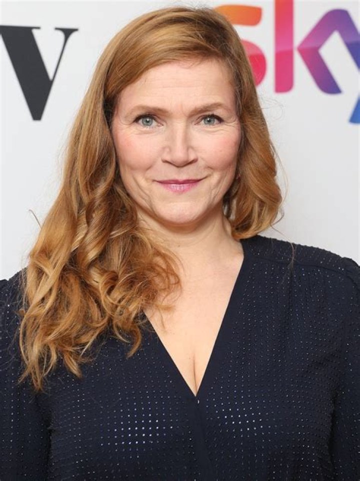 Actress Jessica Hynes opted for full red carpet glam in a floor-length frock