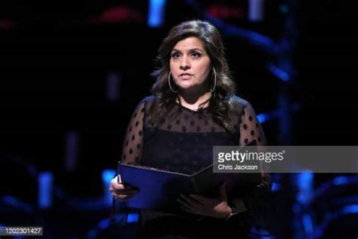 Actress Nina Wadia reads during the UK Holocaust Memorial Day Commemorative Ceremony