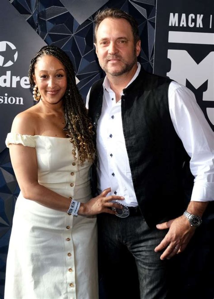 Adam Housley with his wife Tamera Mowry and their kids