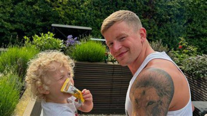 Adam with son George, 7, on his first day back from the hospital
