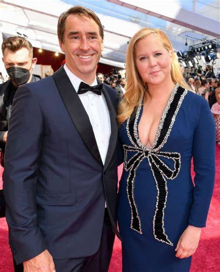 Amy Schumer and Husband Chris Fischer Hold Hands During Red Carpet Date Night 2