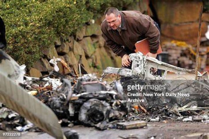  An investigator examines the wreckage