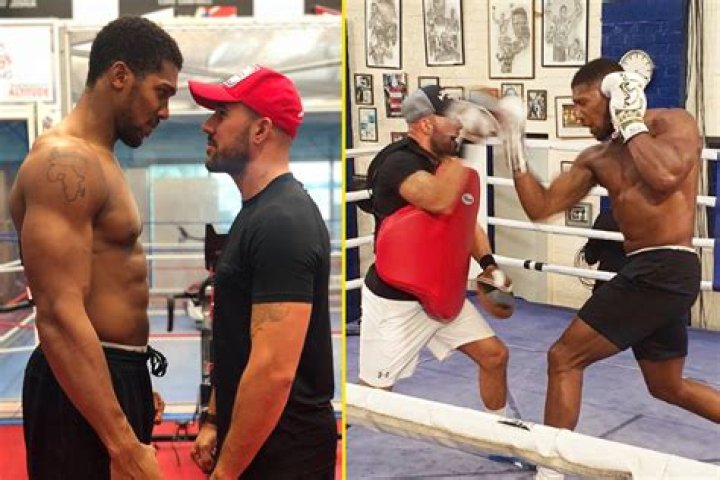 Anthony Joshua made great contact with the machine as he played up to fans during an Easter Tea Party in his hometown of Watford