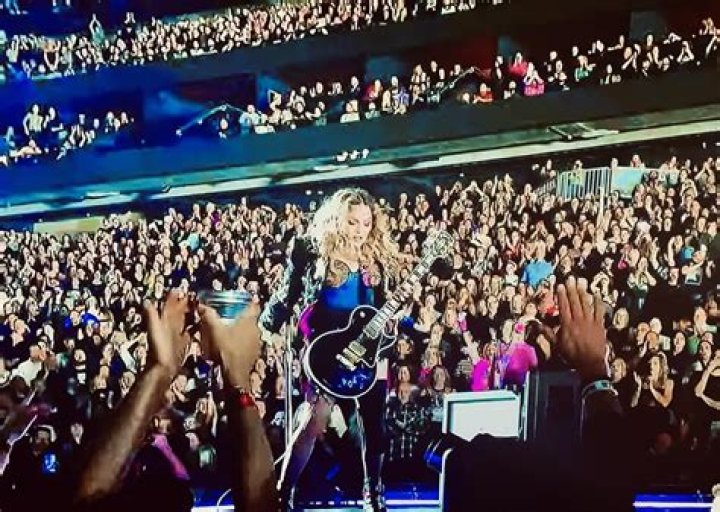 As Madonna kept on rocking, a static dancer shocked all in a risqué outfit