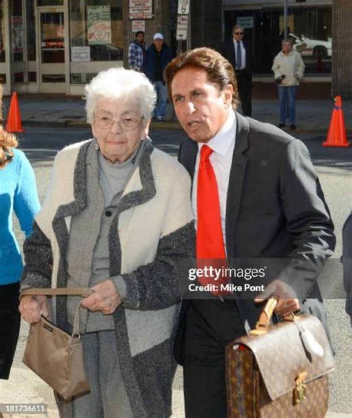 Attorney Marc Heller, arriving at court, maintains his client's innocence