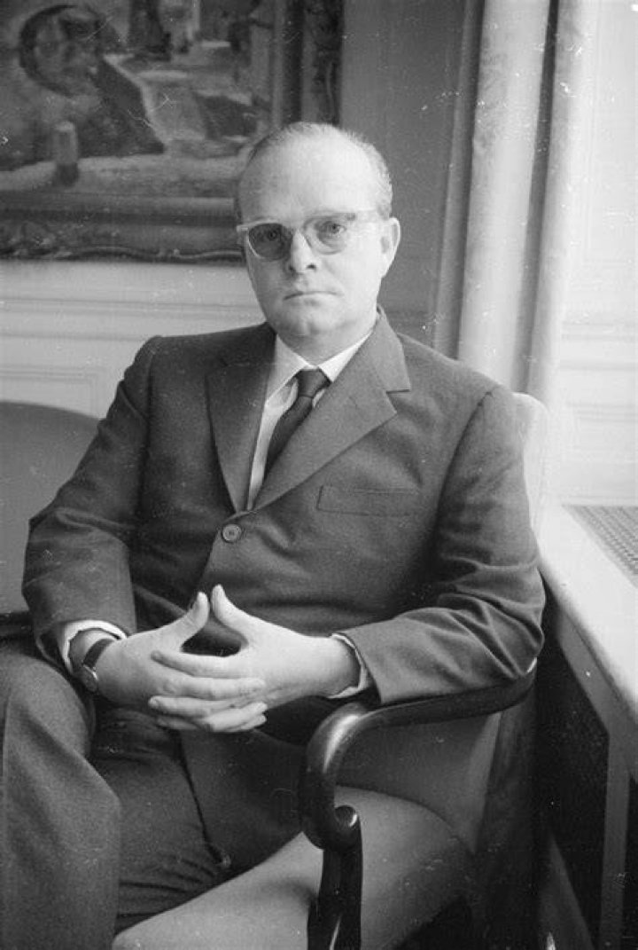 Author Truman Capote, seen at an undated New Year's Eve party, committed social suicide after he exposed his friends' dark secrets in his writing