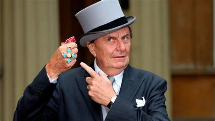 Barry Humphries as his outrageous alter ego Dame Edna Everage