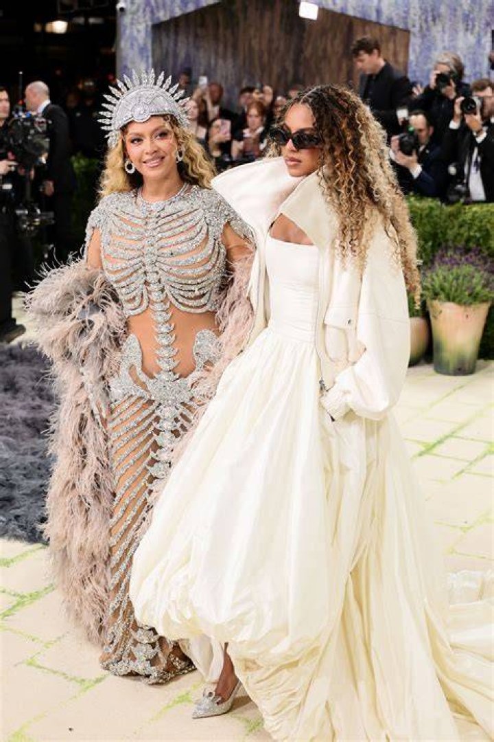 Beyonce wore a pair of very revealing denim chaps along with a matching thong, blue T-shirt and cowboy hat as she promoted her Ivy Park Rodeo collection with Adidas