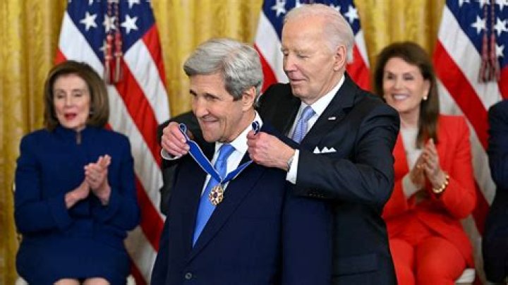 Biden and Kerry are pictured here in Iowa in February