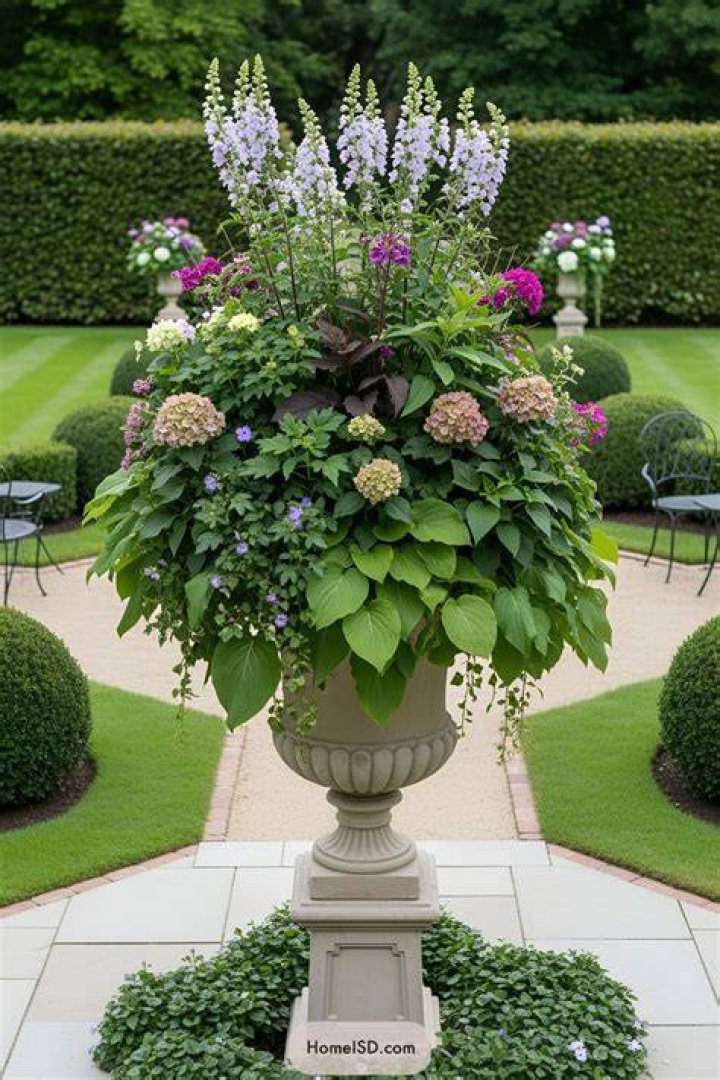 Big plants and ornate pots can add some grandeur to your pad