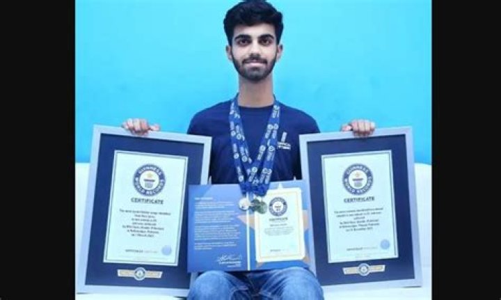 Bilal Ilyas Jhandir, 20, poses with his latest Guinness World Record