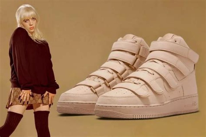 Billie seen wearing an adidas hoodie and sneakers in 2017