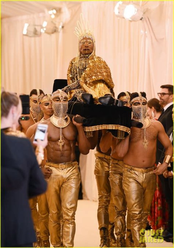 Billy Porter was carried by six shirtless men at least year's event