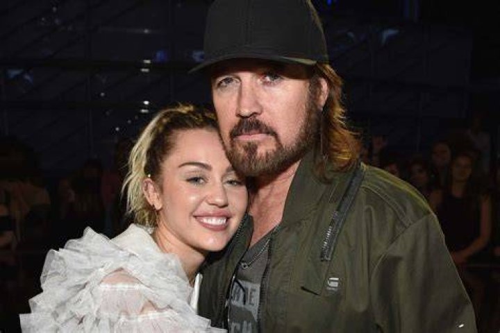 Billy Ray Cyrus, Miley Cyrus, and Tish Cyrus during happier times