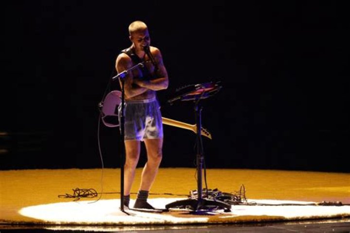 Boxers appeared on stage as she launched into Erotica
