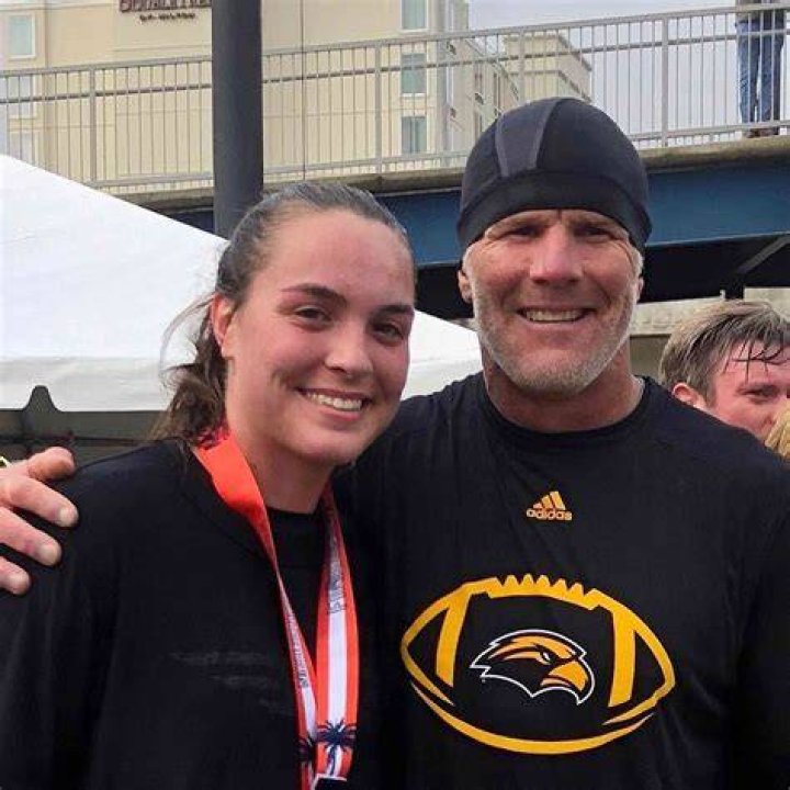 Brett Favre with daughter Breleigh and wife Deeana