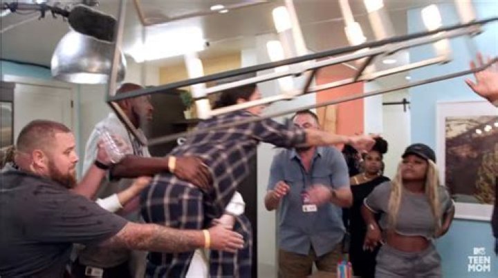 Briana lunged at her co-star and was held back by security