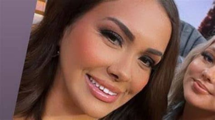 Briana nearly poured out of her tube top bikini while on a boat at a Florida beach