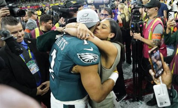 Burrows joined Hurts on the field after Philly's NFC title win
