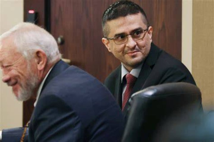 Capital murder defendant and former U.S. Border Patrol Juan David Ortiz, right