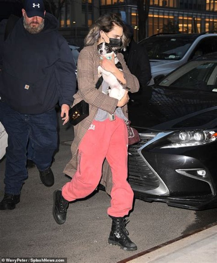 Cara cuddled her pooch in another cute snap