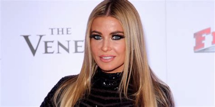 Carmen Electra has shown off her incredible figure in a new photo to promote her OnlyFans account (pictured in 1997)