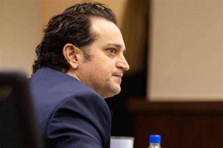 Charlie, 47, is seen glaring at jurors on November 6 before he was found guilty of hiring hitmen to shoot Markel to death in his front driveway in 2014