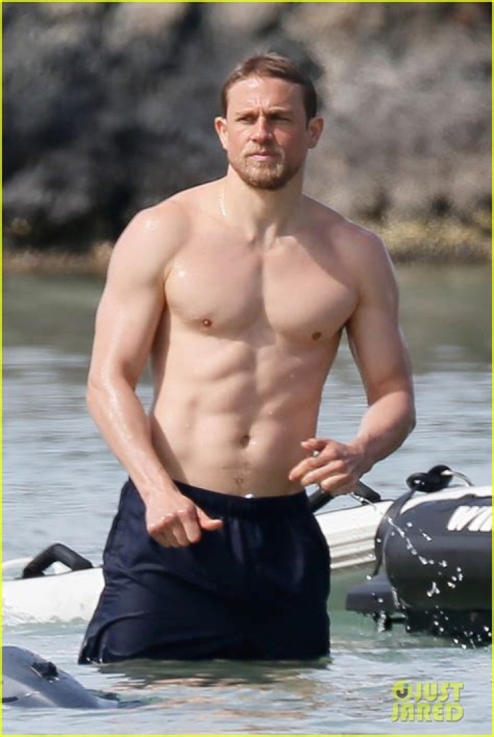 Charlie Hunnam shirtless beach mystery woman