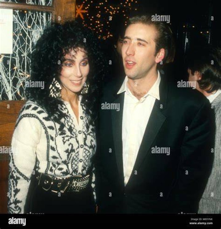 Cher alongside Nicholas Cage in Moonstruck (1987), the film which won her an Oscar