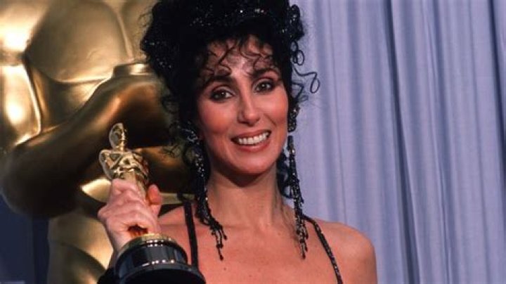 Cher with her Oscar in 1988 - her movie career was derailed by illness