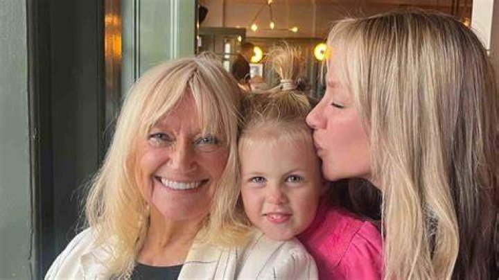 Chloe showing off her mum's wedding ring