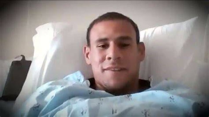 Chris Pospisil was dragged underwater by a shark after he bit his foot