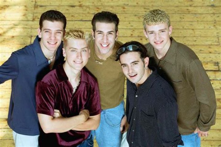 Chris took a group photo with his three kids