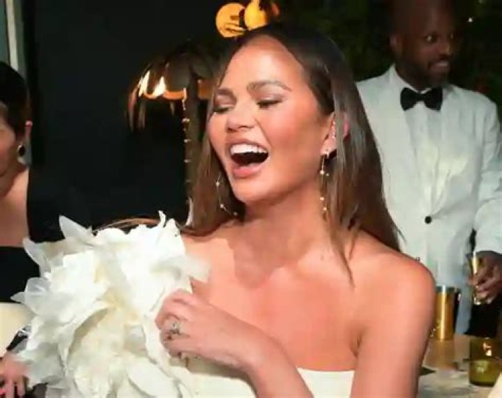 Chrissy Teigen Pokes Fun Hilarious Tan Lines Posing Topless