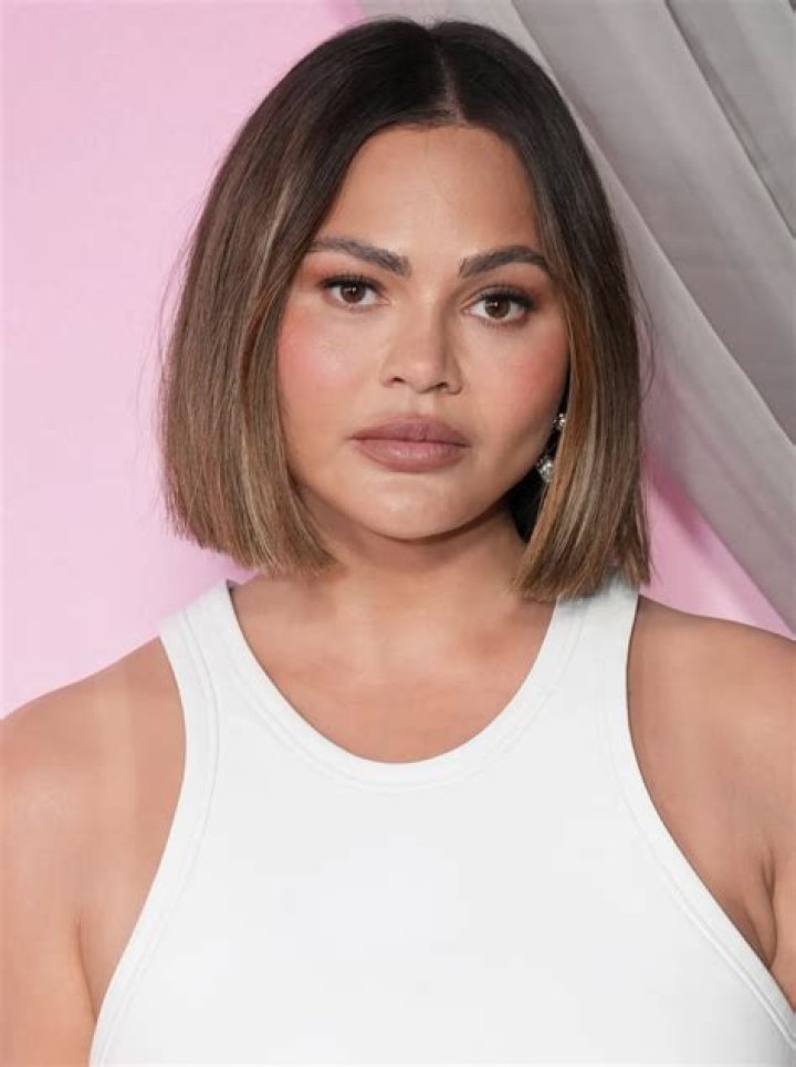 chrissy-teigen-white-turtleneck-tank-instagram