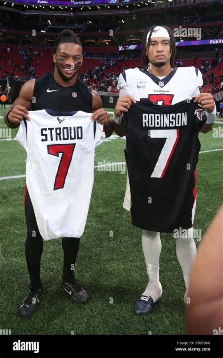 CJ Stroud, Bijan Robinson, and Bryce young (from left to right) worked a shift at a Raising Cane's restaurant in Kansas City two days before the 2023 NFL Draft